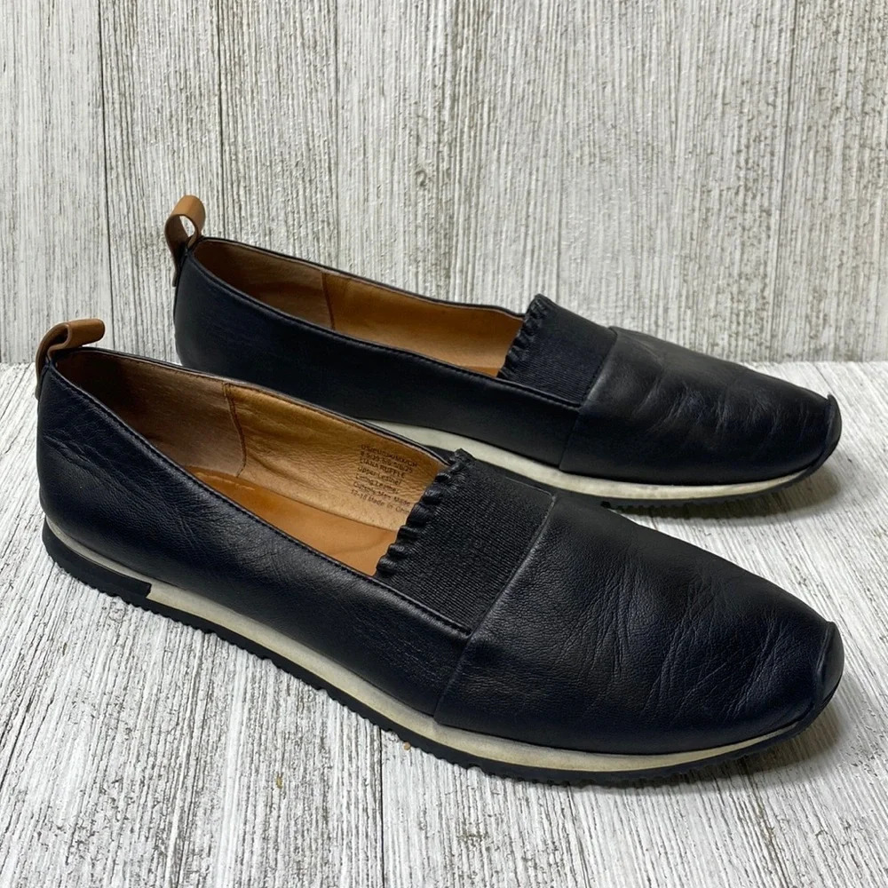 ROXANNE RUFFLE SLIP-ON SNEAKERS IN BLACK